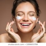 https://image.shutterstock.com/image-photo/laughing-girl-applying-moisturizing-cream-260nw-1006653784.jpg